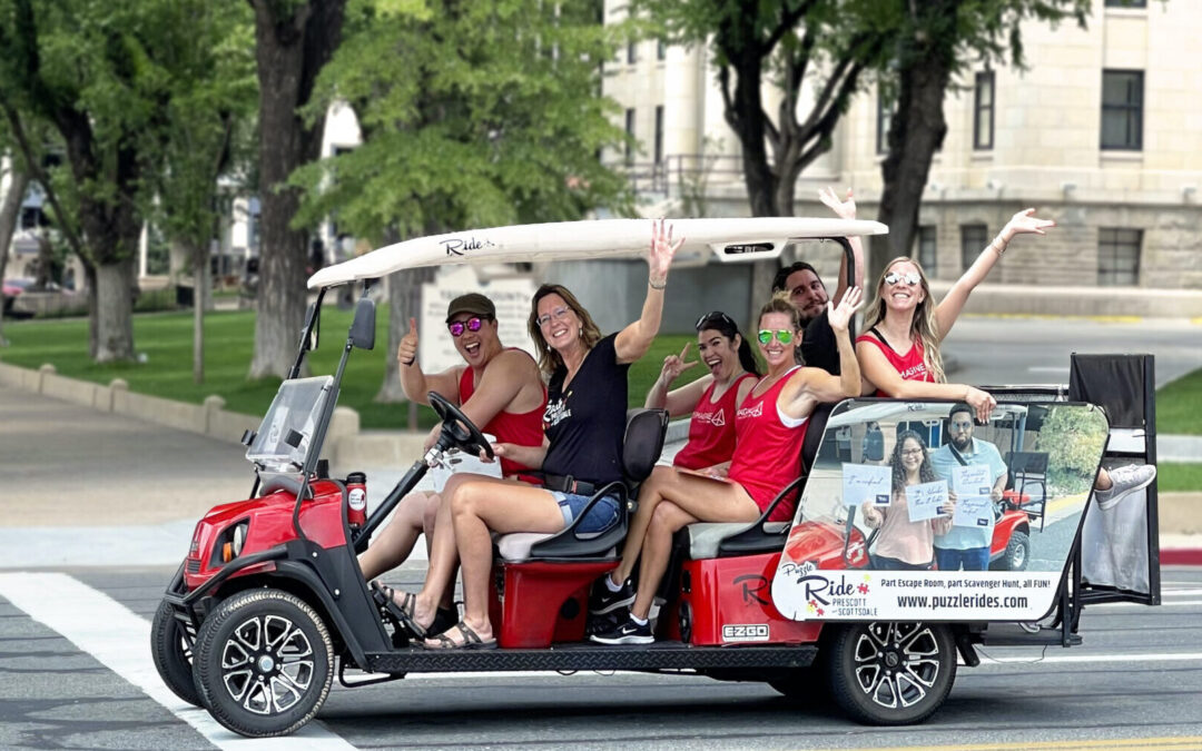 The best activity in Prescott Arizona. group of friends on a golf cart escape room, scavenger hunt.
