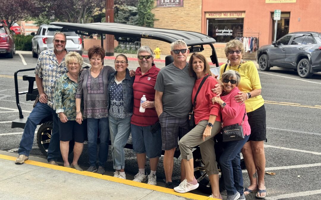 Group solving clues on a Puzzle Ride through downtown Prescott.